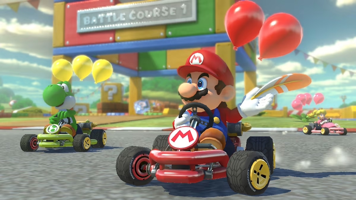 Mario and Yoshi in Mario Kart 8 Deluxe battle mode / Mario and Yoshi drive on Battle Course 1 in Mario Kart 8 Deluxe. Mario is holding a feather. / Image credit: Nintendo