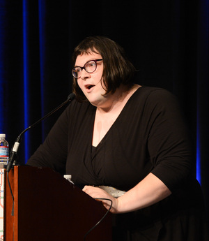 Anna Anthropy speaking at GDC 2013. / Sorry, we don't have accessible text for this image :( / Image credit: Official GDC / This work is licensed under Creative Commons Attribution 2.0